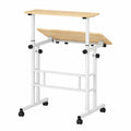 Bureau réglable en hauteur avec plateau inclinable et roulettes pour petits espaces